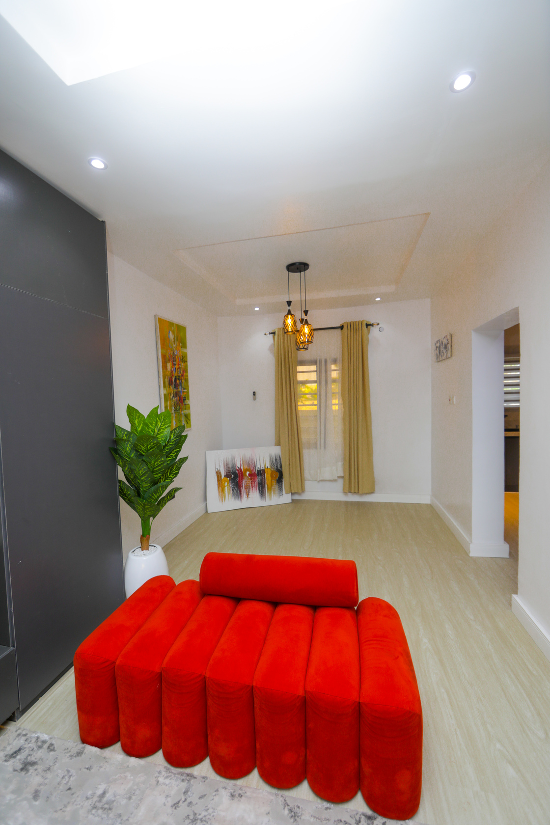 Modern city apartment interior with contemporary furnishings and urban views