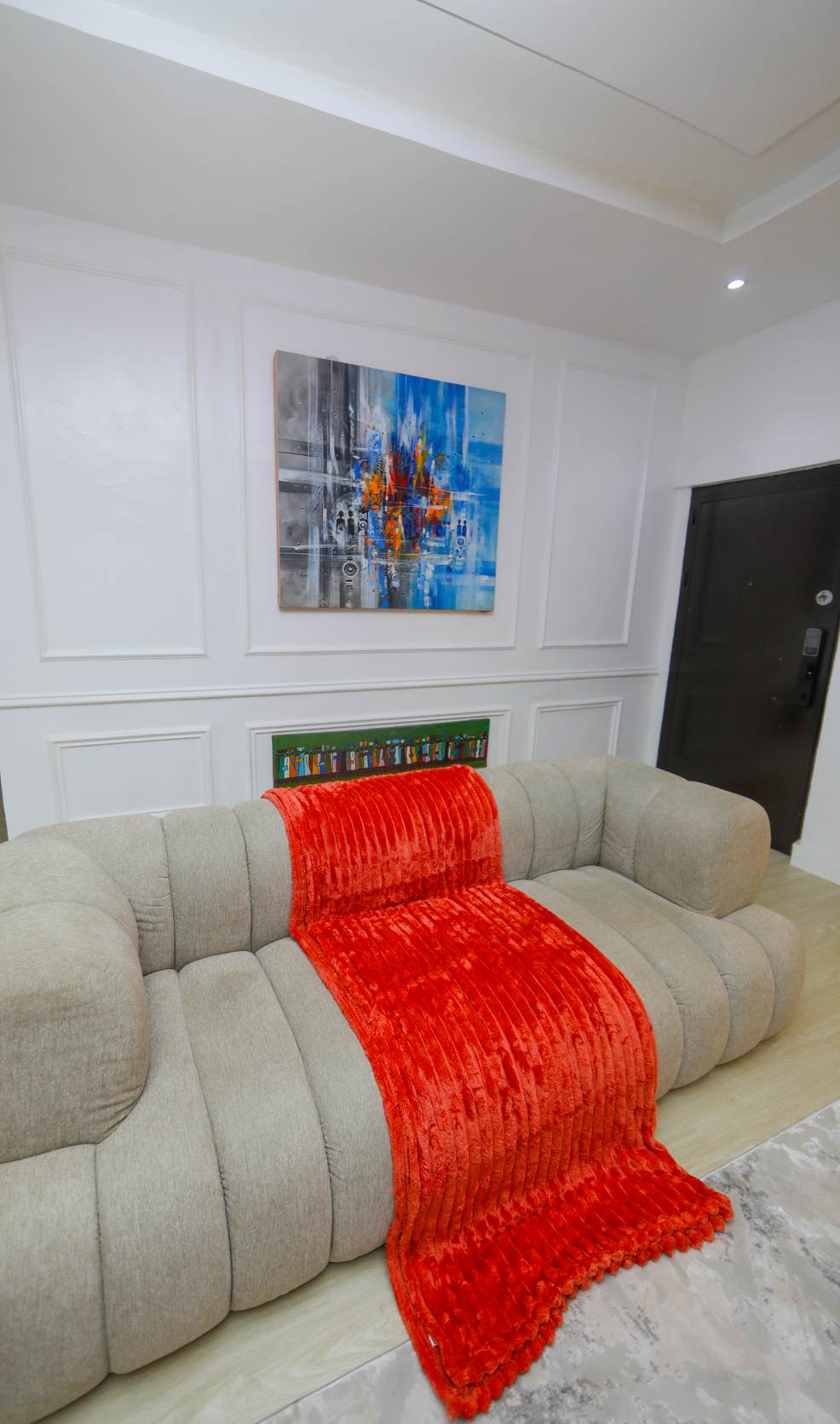 Sofa with vibrant wall art